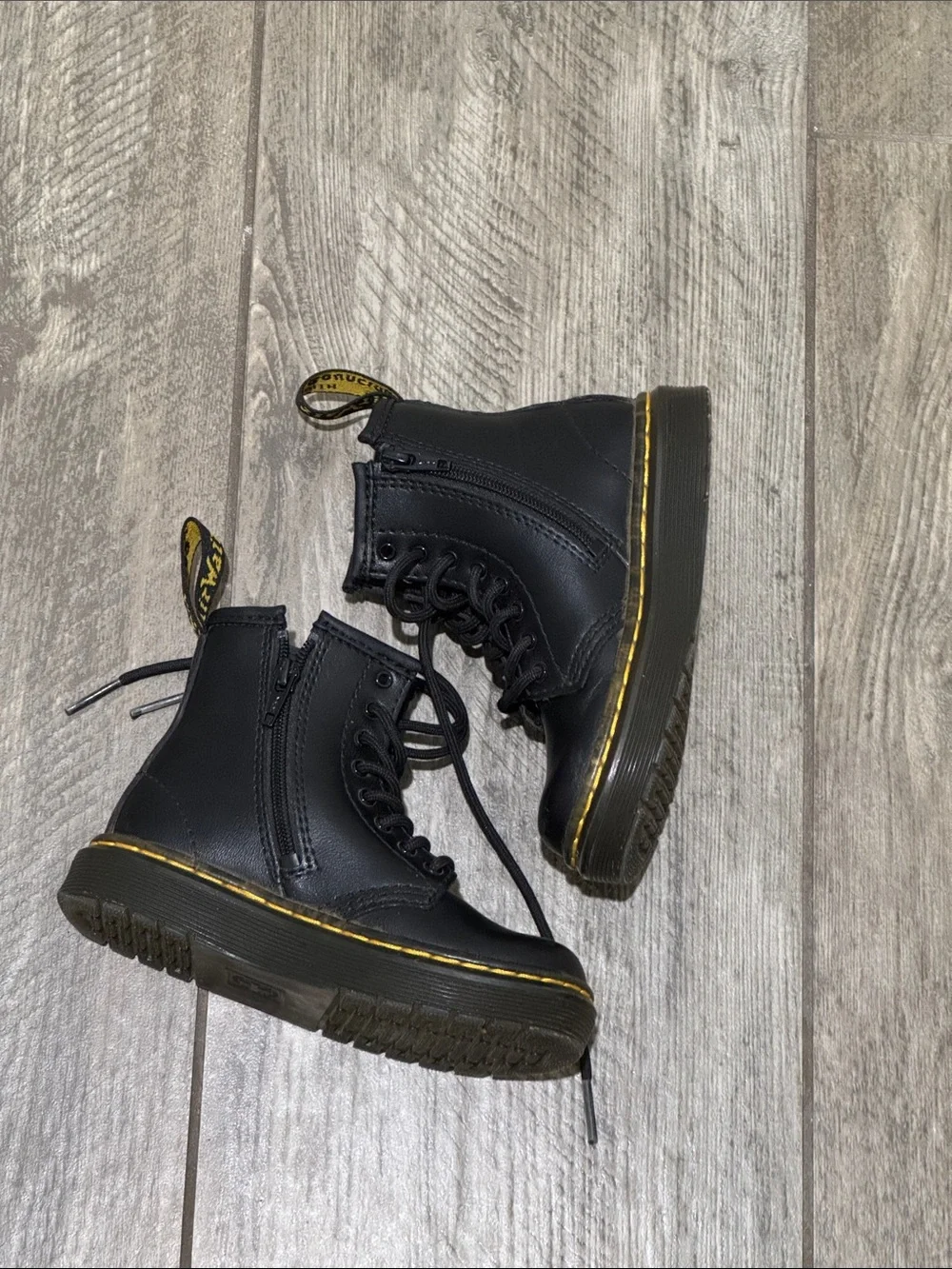 Dr. Martens Kids Black Lace-Up Boots with Yellow Stitching